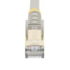 StarTech.com 1ft CAT6a Ethernet Cable – 10 Gigabit Shielded Snagless RJ45 100W PoE Patch Cord – 10GbE STP Network Cable w/Strain Relief – Gray Fluke Tested/Wiring is UL Certified/TIA